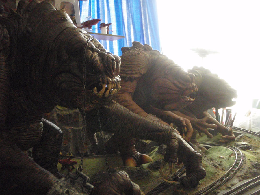 rancor_species_by_krulos-d3apr5p.jpg