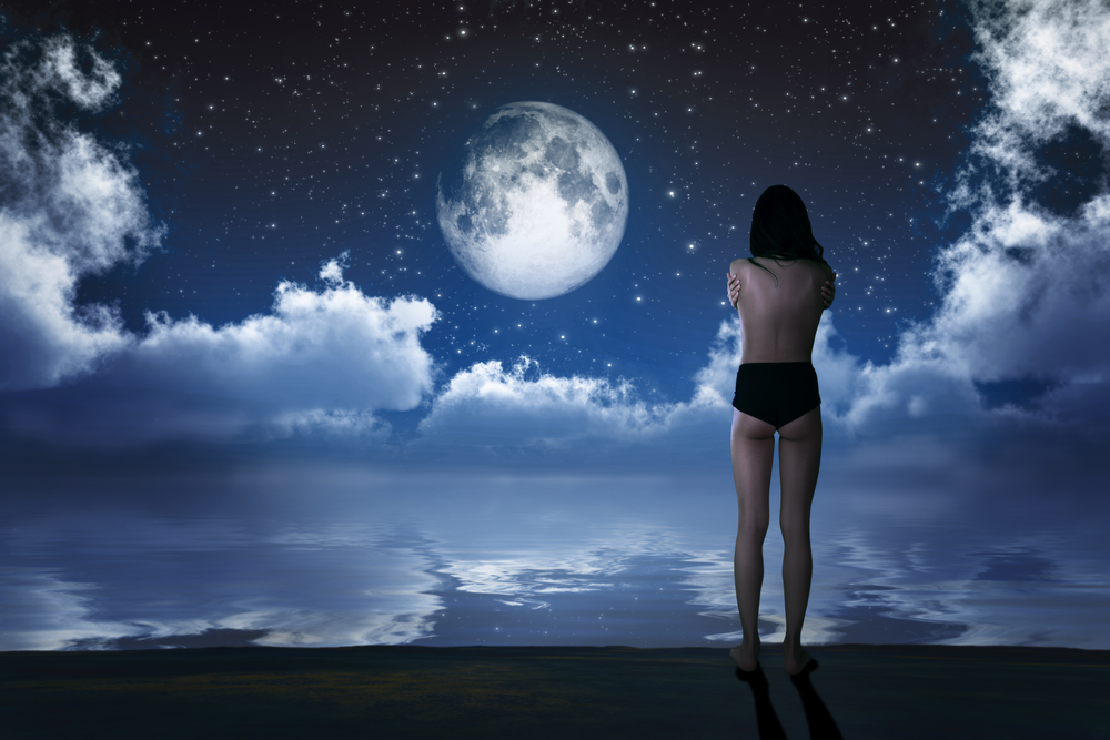 girl-standing-in-front-of-new-moon.jpg