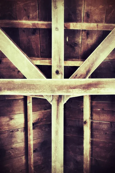 dep_12626885-Wooden-roof-cross-symbol.jpg
