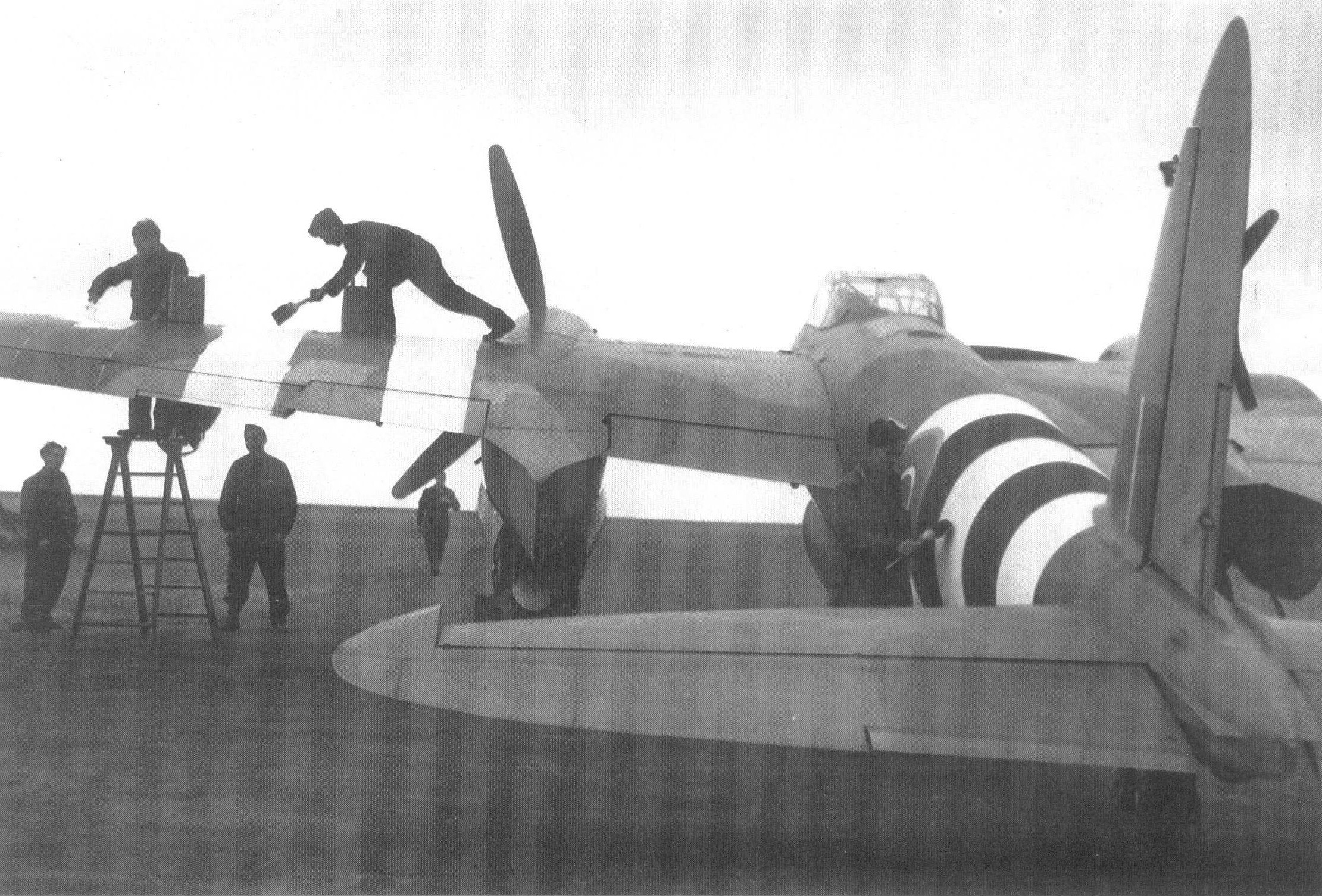 Mossie-painted-in-D-Day-stripes.jpg